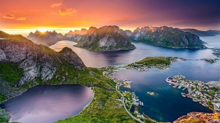Lofoten Norway city houses road mountains water sunset