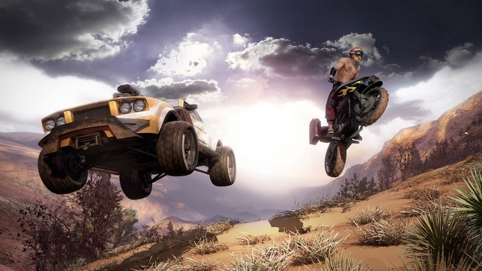 Off-road SUV and motorcycle in mid-air jump
