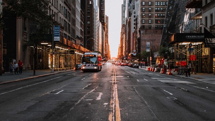 Bus on a New York City Street at Sunset
