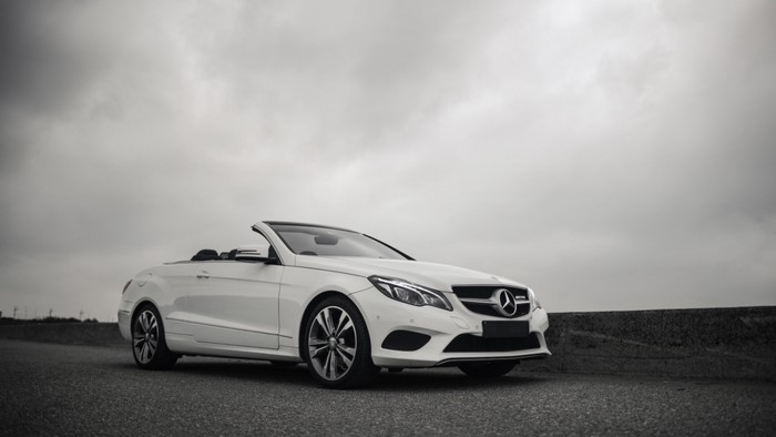 White Mercedes-Benz E200 Convertible on a Cloudy Day
