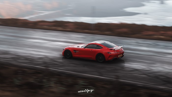 Red Mercedes AMG GT R driving on a wet road in Forza Horizon 4