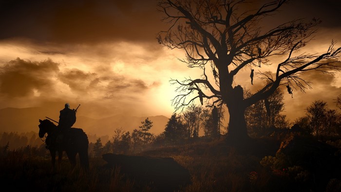 Geralt on horseback near a gallows tree in The Witcher 3