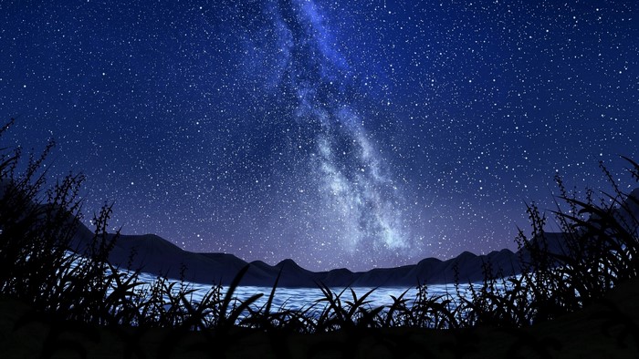 Milky Way over a lake at night