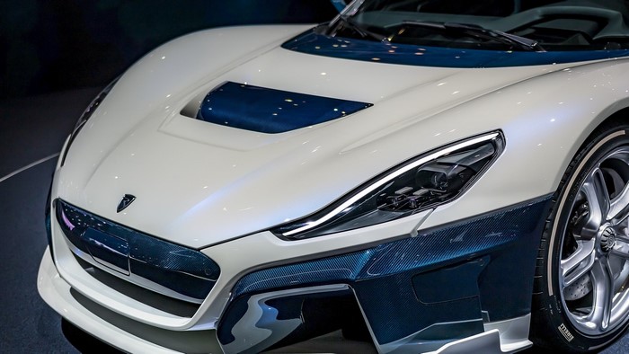 White Rimac electric hypercar with blue accents