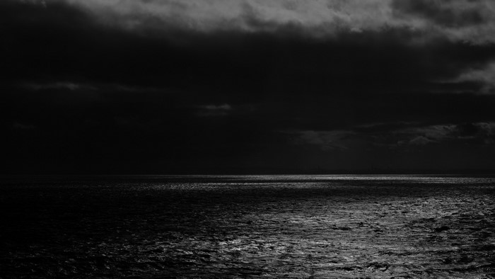 Dark Ocean Under Stormy Clouds