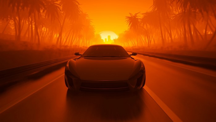 Sports car driving on a road at sunset