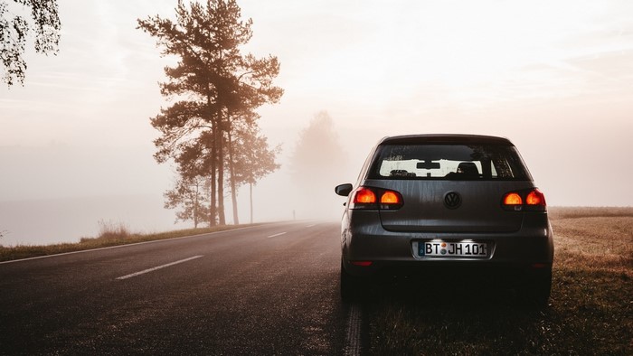 Volkswagen Golf on a foggy road