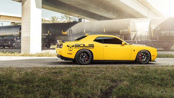 Yellow Dodge Challenger Hellcat with Solis Racing Group decal