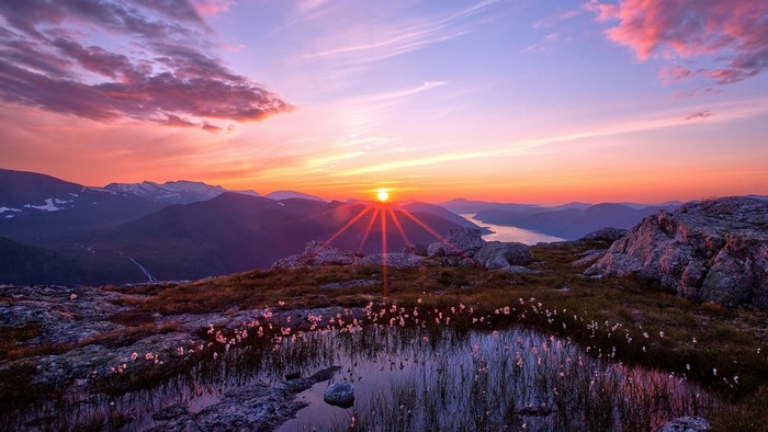 Sunset over mountains and a fjord