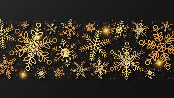 Golden snowflakes on a dark background