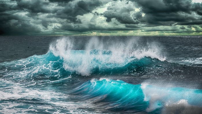4K Sea Waves Under Stormy Clouds