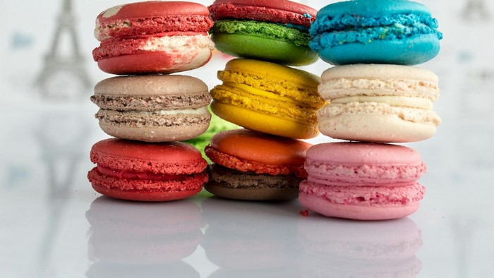 Colorful Macarons stacked in piles