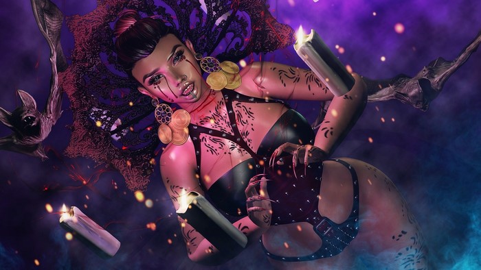 Fantasy girl with bats and candles