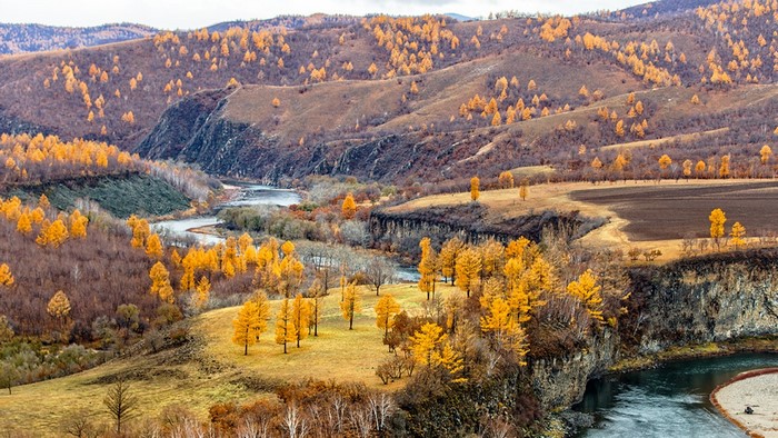 Autumn landscape with river and hills