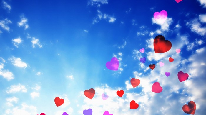 Hearts Floating in a Blue Sky with Clouds