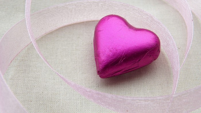 Pink heart chocolate with ribbon