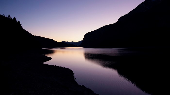 Lake and mountains at twilight