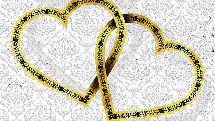 Two Intertwined Golden Hearts with Ornate Pattern