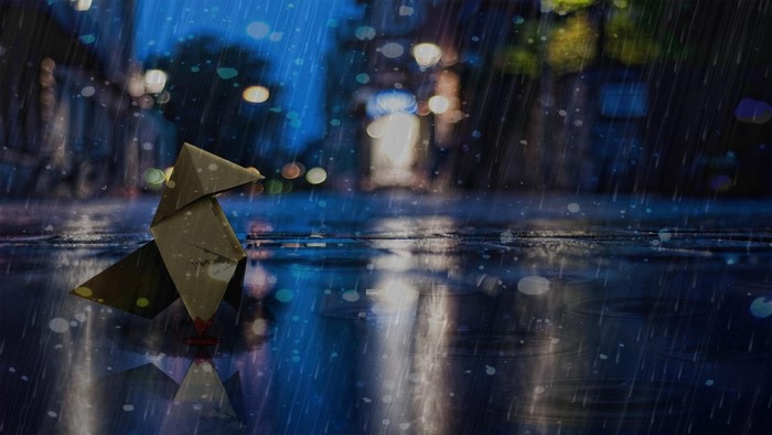 Origami bird in heavy rain on wet street