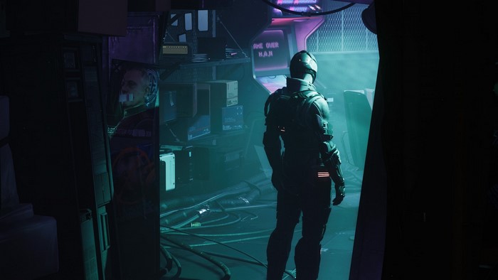 Man in armor near arcade machine