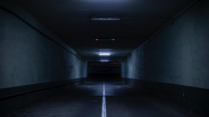 Dark tunnel with fluorescent lights