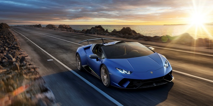 Lamborghini Huracan Performante Spyder driving on coastal road