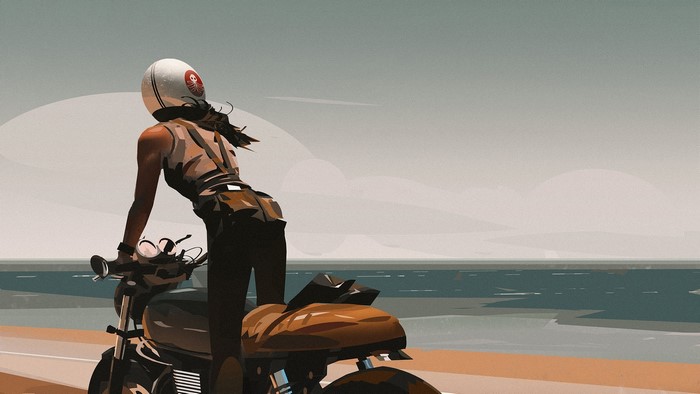 Girl on a motorcycle by the sea