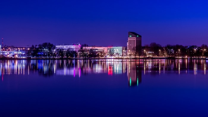 Cityscape with lake reflection at night
