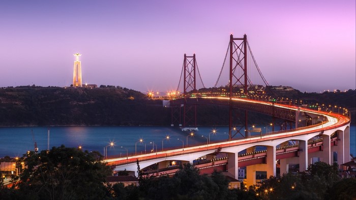 25 de Abril Bridge and Christ the King statue in Lisbon