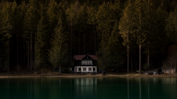 House by the lake in a forest