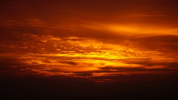 Fiery Sunset Sky with Clouds