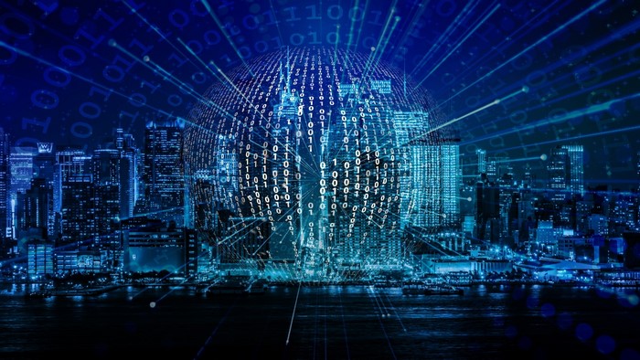 Digital Globe Over Cityscape with Binary Code