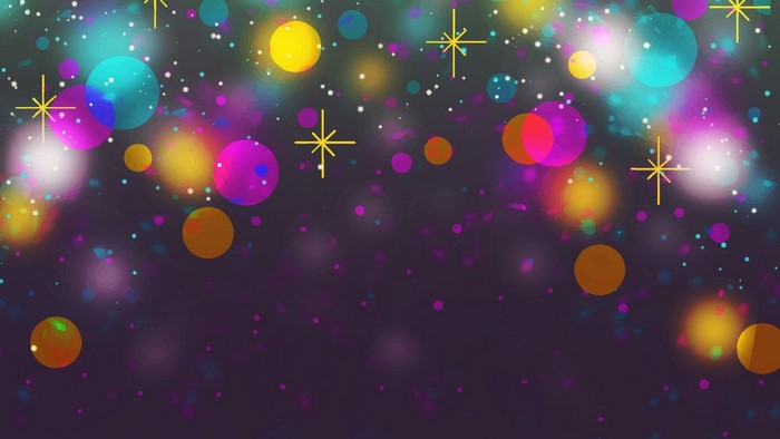 Colorful bokeh and starbursts on dark background
