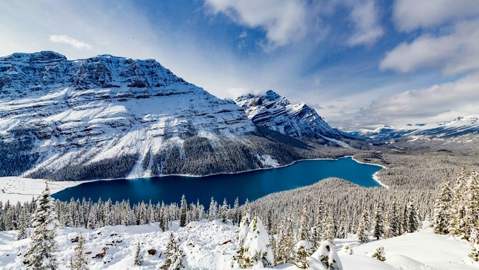 Snowy Mountains and Blue Lake Landscape