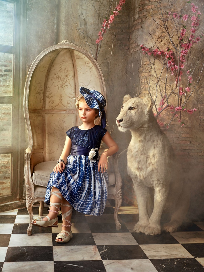 Girl with White Lion in Elaborate Setting