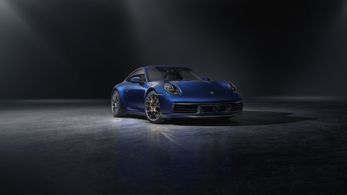 Blue Porsche 911 on a dark background