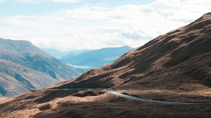 Winding road through mountainous landscape