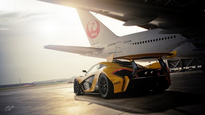 Yellow McLaren P1 and JAL Airplane