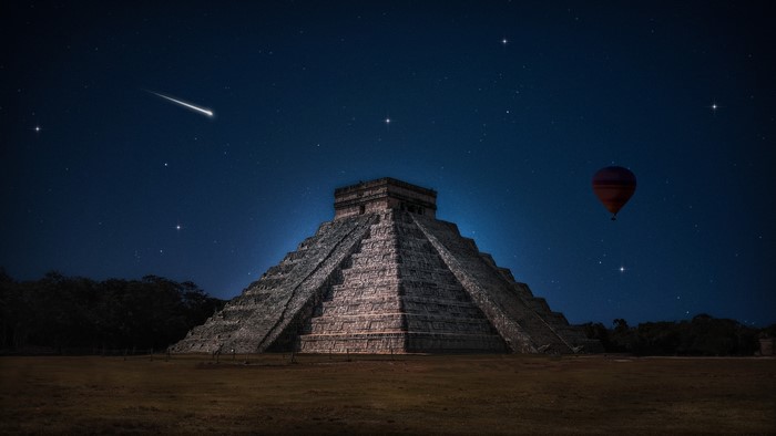 4K Pyramid Under a Starry Night Sky with Meteor and Hot Air Balloon
