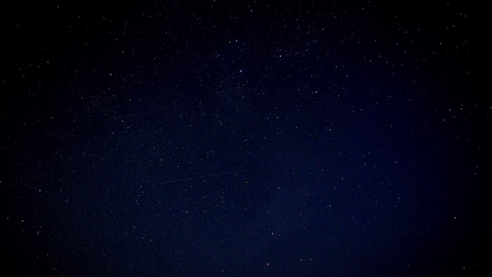 Starry Night Sky with Meteor Shower