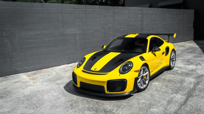 Yellow Porsche 911 GT2 RS with black stripes