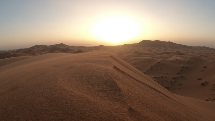 Desert dunes at sunset