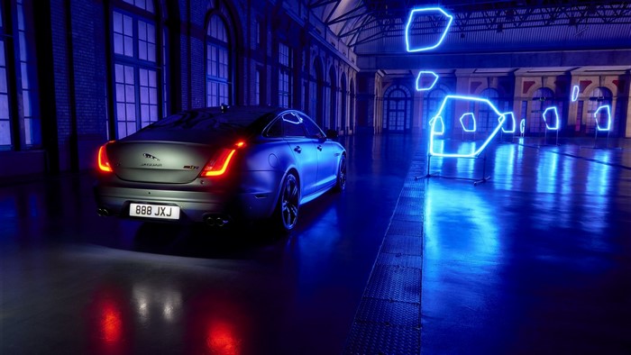 Jaguar XJR sedan with neon lights