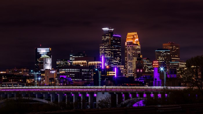 Minneapolis Skyline at Night with Purple Bridge