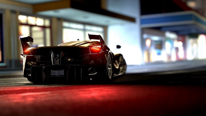 Ferrari FXX K sports car at night
