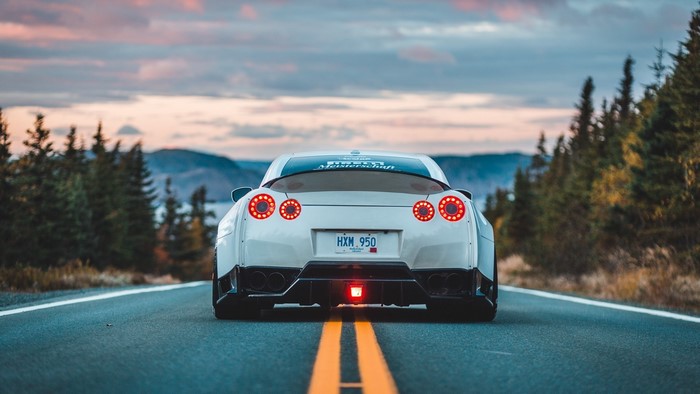 White Nissan GT-R on a road