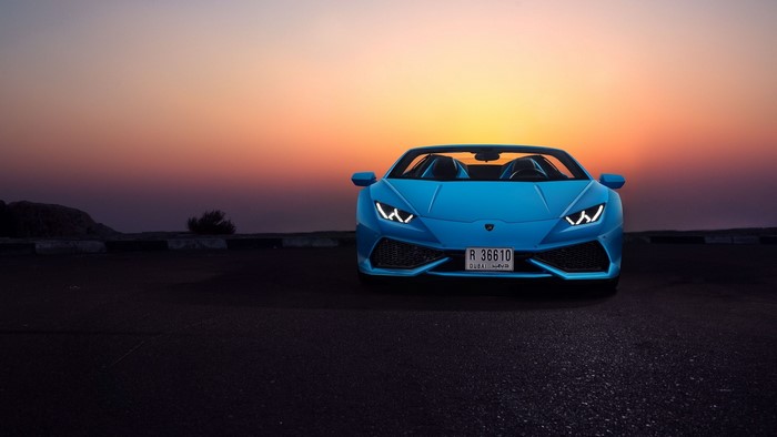Blue Lamborghini Huracan Spyder at Sunset