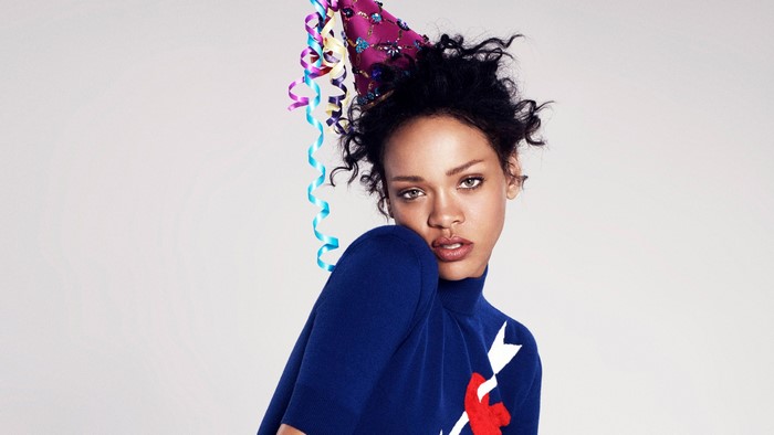 Rihanna wearing a party hat