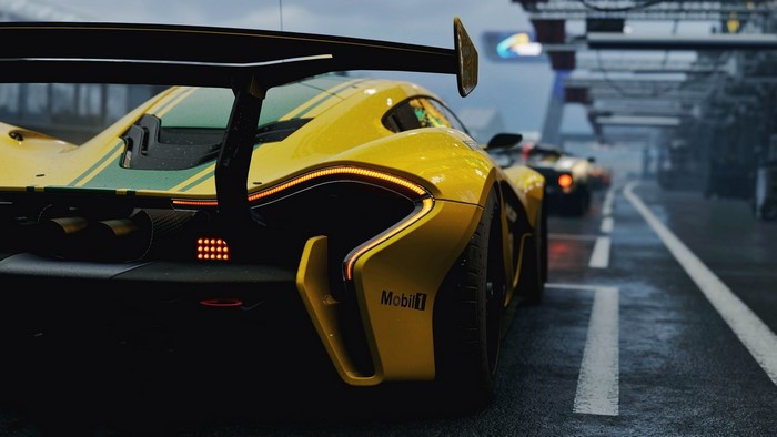 Yellow McLaren P1 GTR on wet track