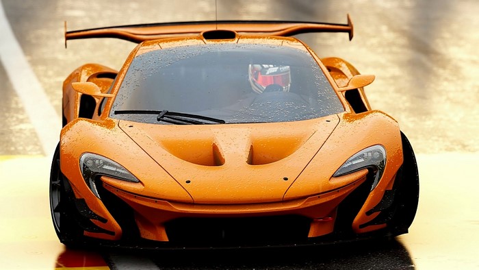 Orange McLaren P1 GTR with driver